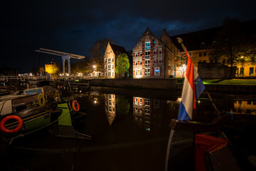 Old warehouses on the water of Dutch canals