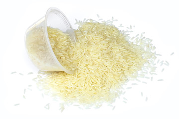 rice grains in bowl close up isolated on white background, scoop with rice on white, Top view