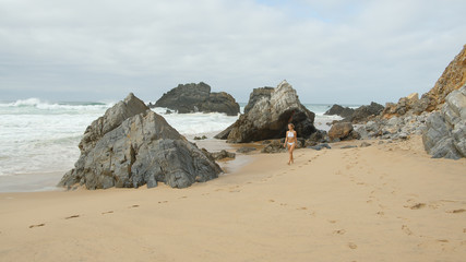 Beautiful Adraga Beach at the Atlantic Ocean coast in Portugal - travel photography