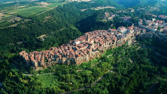Wide aerial shot of the hillside town of Pitigliano, Tuscany, Italy. Aerial shot from drone.