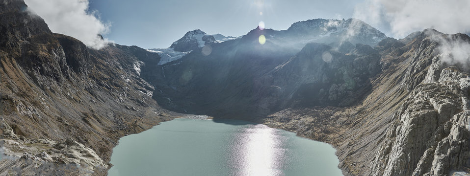 Panoramic view of Triftsee lake, and Trift glacier (Triftbr&uuml;cke). Switzerland