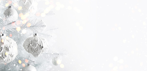 Decorated white ornaments Christmas tree on white background. Merry Christmas and Happy Holidays...