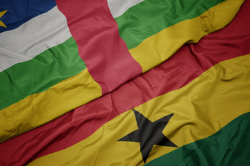 waving colorful flag of ghana and national flag of central african republic.