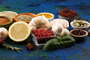 Fototapeta na wymiar Spices and herbs on table. Food and cuisine ingredients for good cooking
