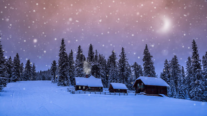 Winterwunderland-Märchenhafte Almhütten mit rauchendem Kamin und gemütlichen Lichtern in einer...