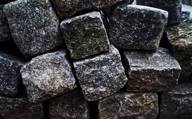 Texture / background: stone, square blocks.