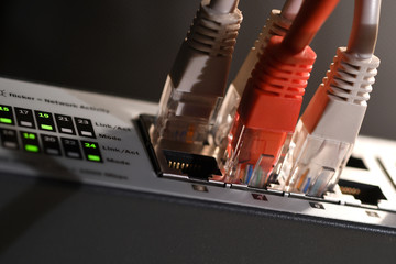 Detail of lights on Network switch and ethernet cables rj45. Data Center Concept. Macro Shot.