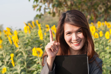 Business woman pointing an idea