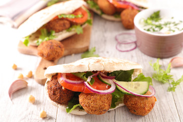 sandwich with falafel, vegetable and sauce