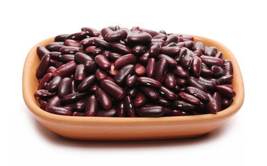Red kidney beans in clay pot, bowl isolated on white background