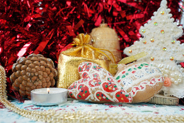 Fototapeta na wymiar Wallpaper with christmas gingerbread cookies, christmas tree, candle, bag Santa
