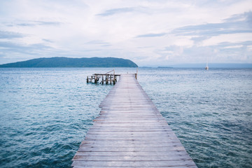 View of pier and blue sea