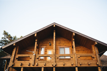 Upper part of wooden cottage.