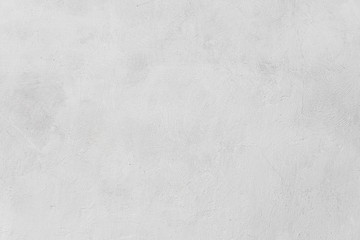 Rough white relief stucco wall texture background. blank for designers