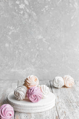 Assorted different flavors of homemade marshmallows. Peach, pink and white marshmallows.