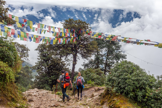 Two people walking on the everest base camp trek close to Surke, on the way from Jiri to Lukla, Sagarmatha national park, Nepal