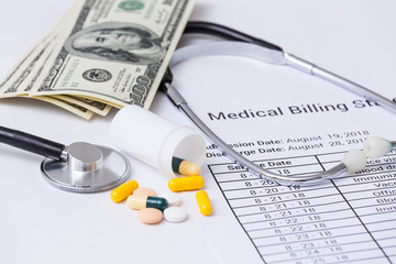 Health care costs. Stethoscope and calculator symbol for health care costs or medical insurance. Stethoscope, calculator and dollar banknotes .Concept of payment for medical service