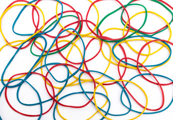 colored rubber bands for money on white background