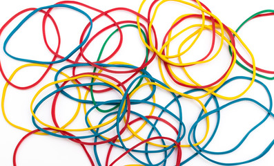 colored rubber bands for money on white background