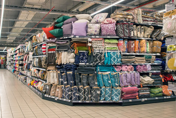Shelves and shop windows in the store with goods and purchases. Shopping at the mall.