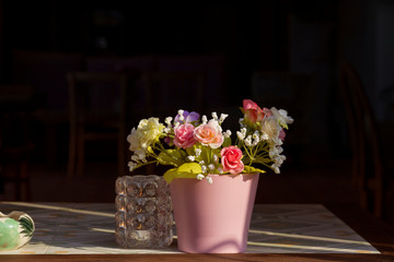 Plastic rose flowers with vintage filter