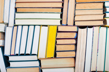 Obraz premium Hardback books on wooden table. Back to school.