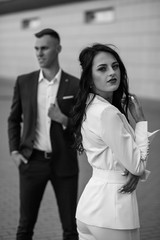 Happy couple while walking through the city street