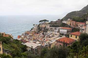 View on Riomaggiore - Cique Terre, sequence of hill cities. Traveling concept background
