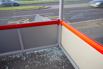 bus shelter broken glass on floor smashed cracked dangerous