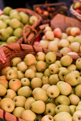 Farm apples in a box on the market. Harvest ripe apples.