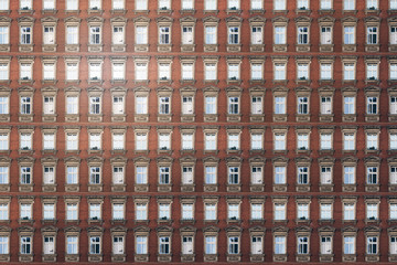 architectural pattern, old berlin house with stucco and red bricks