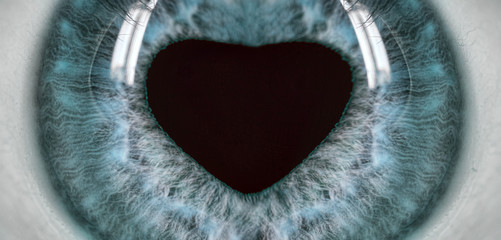 human blue eye with heart shape pupil