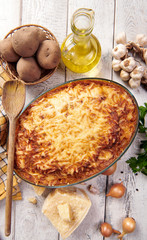 Homemade cheese pie with potatoes and meat