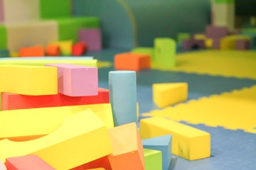 Colorful blocks in kids play room. Blocks of different shapes for children education and early development