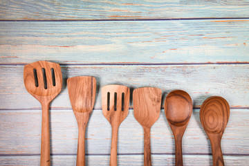Natural kitchen tools wood products / Kitchen utensils background with spoon ladle spatula various sizes object utensil wooden concept