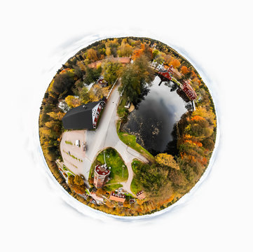 Aerial panoramic view in form of small planet of old village Ruotsinpyhtaa at autumn, Finland.