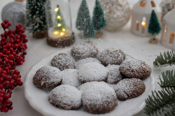 Christmas table scene of assorted sweets and cookies