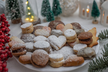 Fototapeta na wymiar Christmas table scene of assorted sweets and cookies