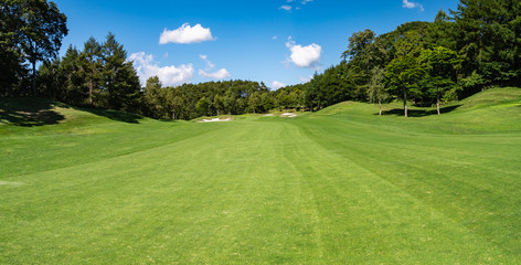 Golf Course with beautiful green field. Golf course with a rich green turf beautiful scenery.