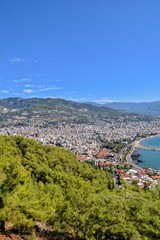 Fototapeta na wymiar summer view of the city and the sea from the hill in Alanya, Turkey on a warm sunny day