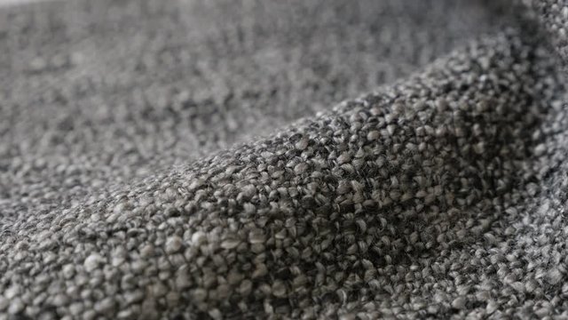 Tilting on blanket made of yarn close--up 4K footage