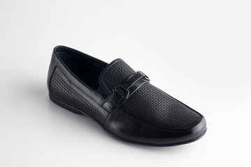 Men fashion black shoe loafer isolated on a white background.