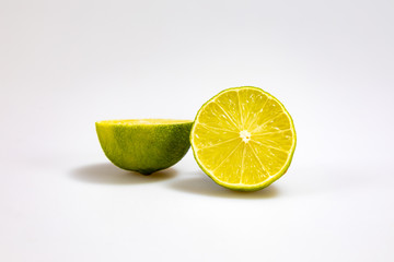 Cut lime in a white background