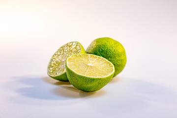 Cut lime in a white background