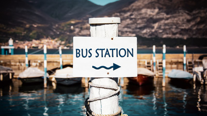 Street Sign to Bus Station