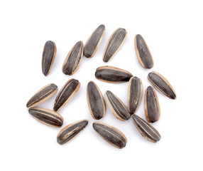 Healthy sun-flower seeds on a white background