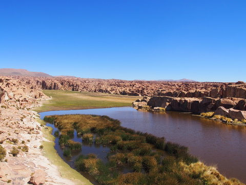 Laguna Misteriosa, Mysterious lake in the midst of beautiful sky and nature, Journey from San Pedro de Atacama in Chile to Uyuni in Bolivia