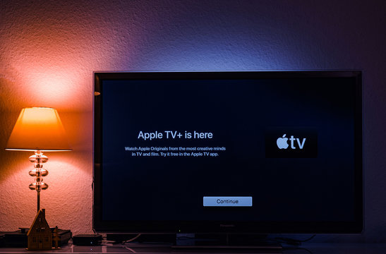 Paris, France - Nov 1, 2019: Apple TV plus is here message on living room display with try for free continue button launch first day over-the-top ad-free subscription video on demand web television