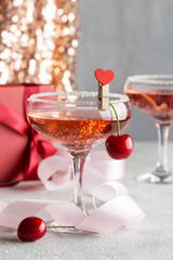 Glass with alcohol beverage in festive