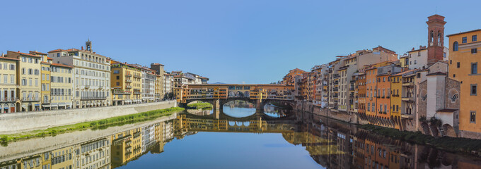.Colorful panoramic of Ponte Vecchio over Arno river,  Florence, Italy